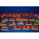 A quantity of boxed Village Cameo collection vans and cars.