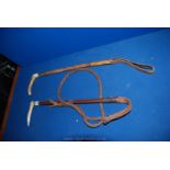 A Swaine huntsman's Whip and a leather bound and antler riding Crop