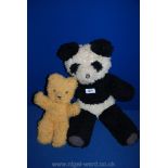 A small loved Teddy 12" tall and a Panda bear 20" tall.