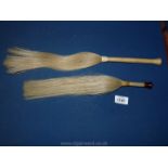 Two old horse-hair Fly Swishes, 18 1/8'' long and 14 1/2'' long approx.