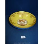 A large Minton Bowl with cockerel decoration and blue and yellow with gilt border,