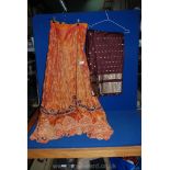 An Indian embroidered wedding skirt and silk sari.