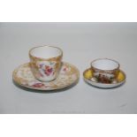 A small 19th century KPM Berlin coffee can and saucer decorated in gold and a Meissen 19th century