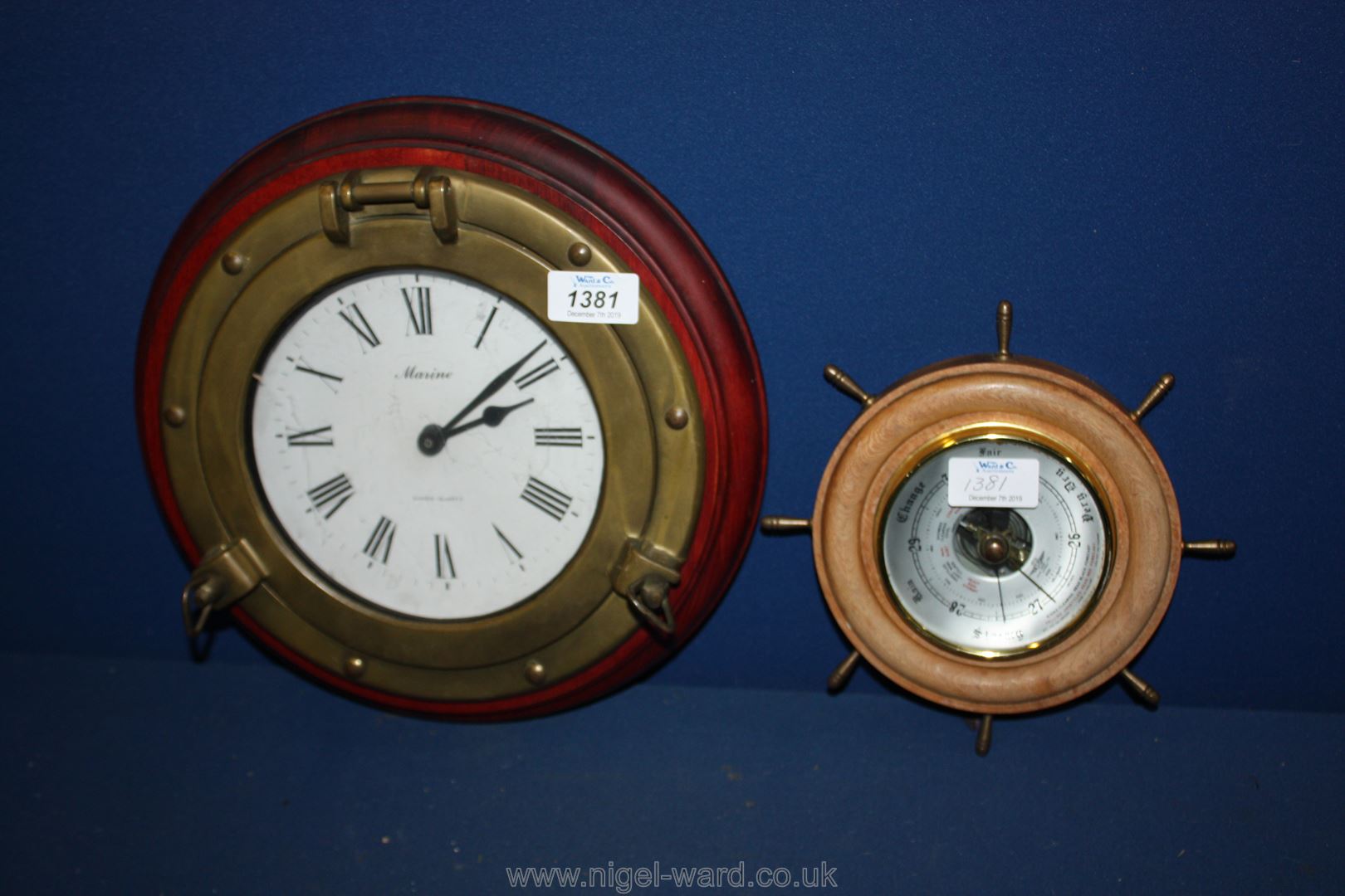 A port hole style Clock and a Barometer.