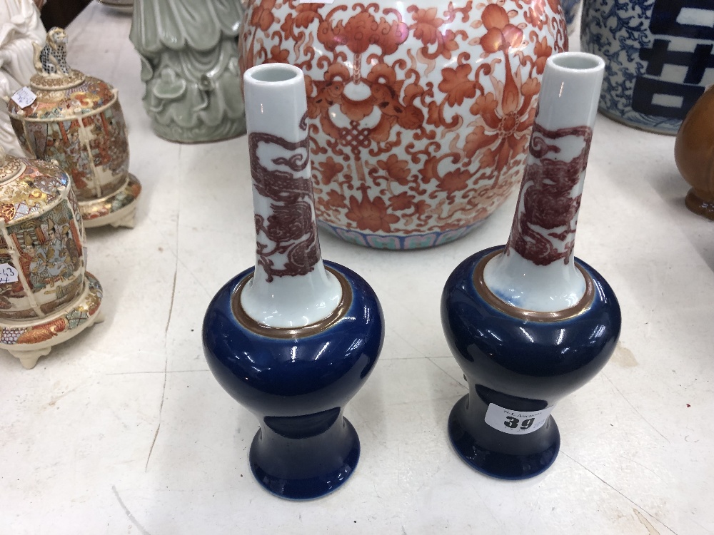 A pair of Chinese long neck vases with blue ground body, painted with red dragons, - Image 2 of 10