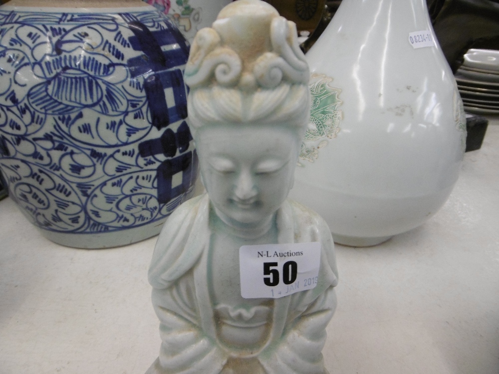 A Chinese 'Song style' porcelain figure of Quan Yin, 20cms high, a. - Image 2 of 3