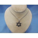 A hm silver 'Star of David' pendant on a silver chain