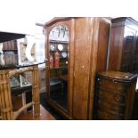 A French Burr Walnut triple wardrobe, early 20th century,