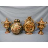 A set of three decorative vases and a ginger jar