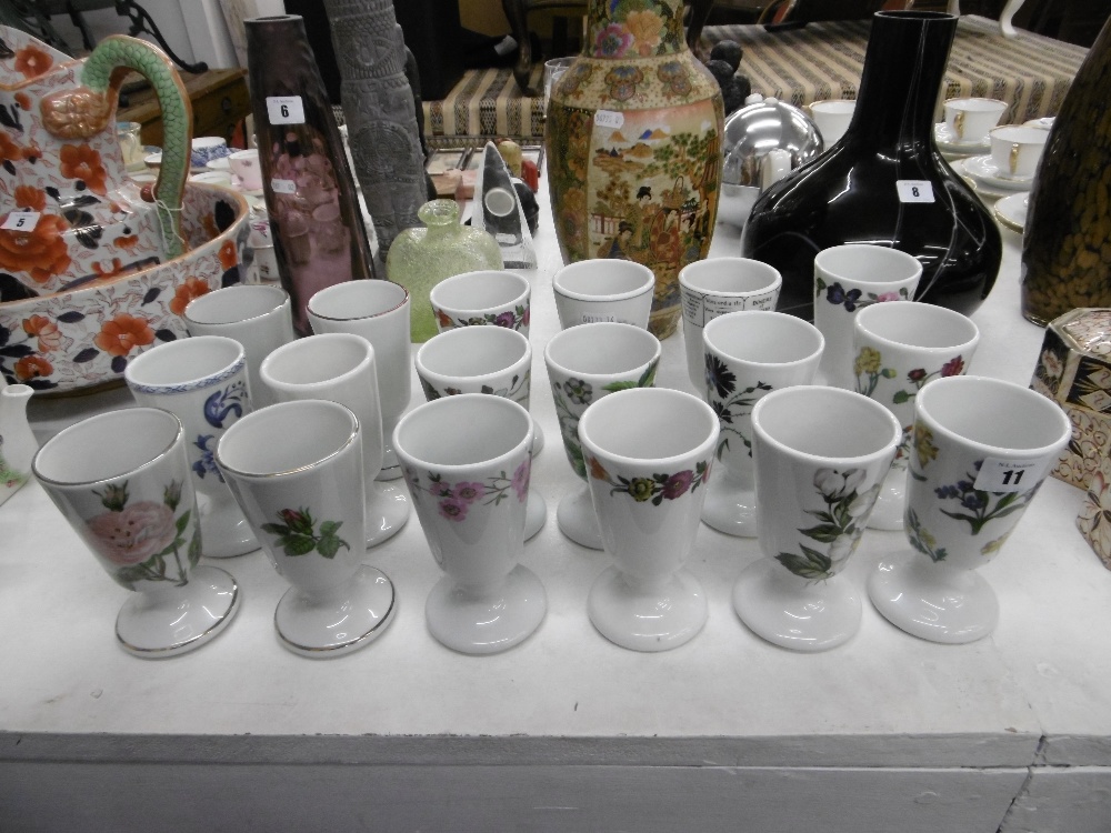 EIGHTEEN DECORATIVE SMALL VASES