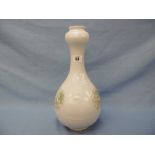 A Chinese cream ground porcelain garlic shaped vase with enamel dragon decoration,
