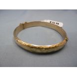 A hm gold bangle,