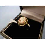 An 18CT gold and cameo ring,