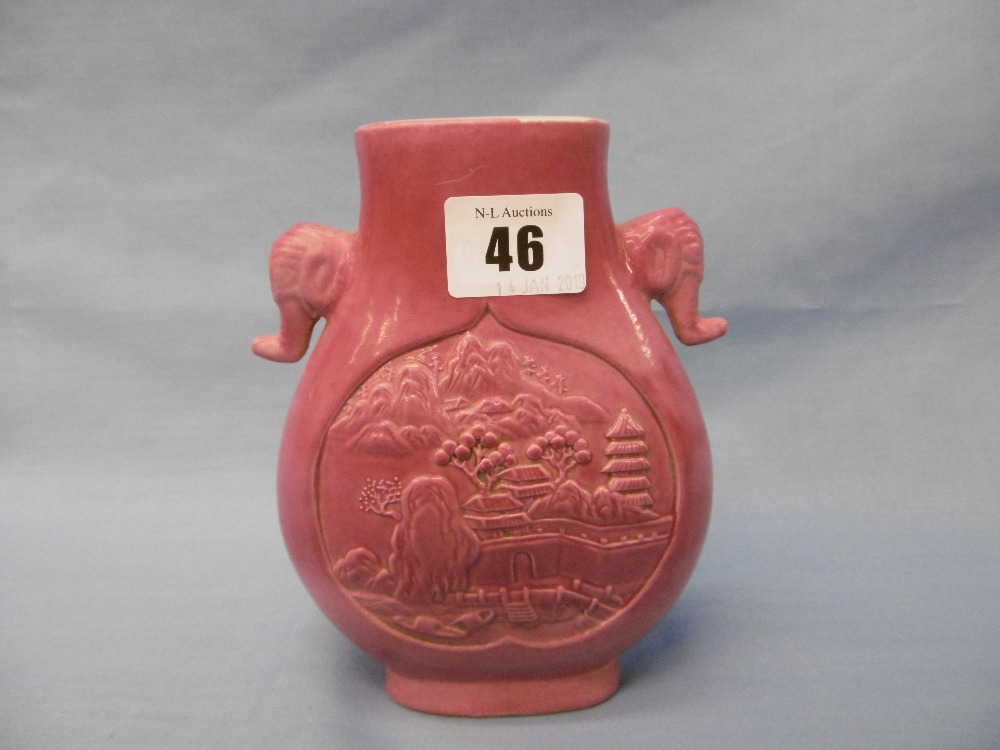 A Chinese pink vase with elephant head handles,