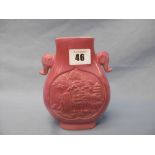 A Chinese pink vase with elephant head handles,