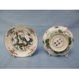 A pair of Chinese ducal porcelain saucers, decorated with dragon chasing the flaming pearl,