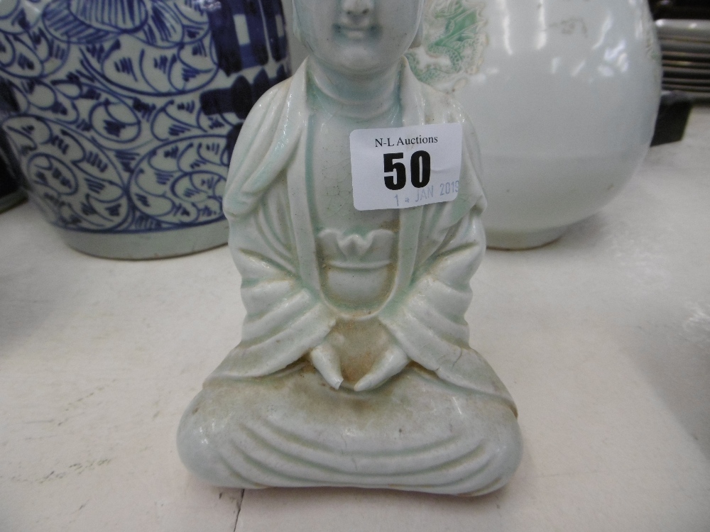 A Chinese 'Song style' porcelain figure of Quan Yin, 20cms high, a. - Image 3 of 3