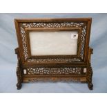 A Chinese hardwood and white jade table screen, 37cms X 33 cms approx.