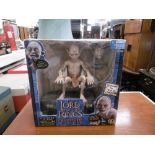 A boxed 'Gollum' character