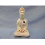 A Chinese 'Song style' porcelain figure of Quan Yin, 20cms high, a.