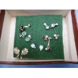 Six pairs of hm gold earrings, inc.