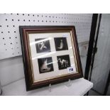 A framed and glazed set of white metal items