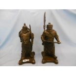 A pair of bronze sculpture of samurai warriors