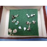 Six pairs of HM gold earrings, inc.