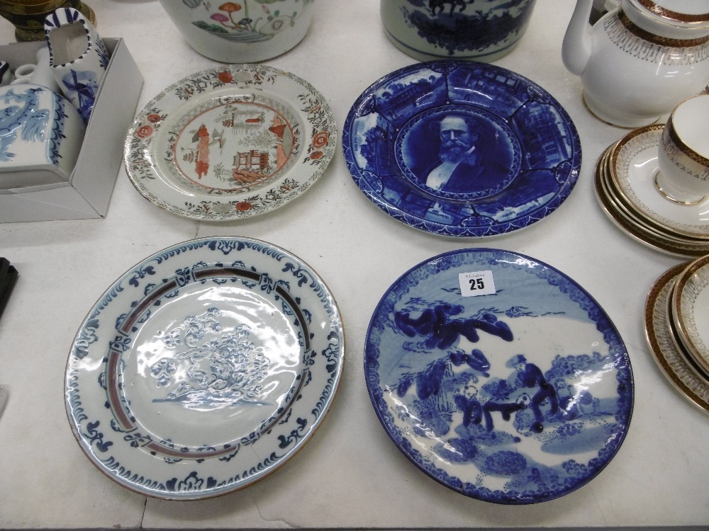 Four cabinet plates including Delft