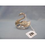 A cut glass & hall marked silver salt in the form of a swan