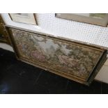 A gilt framed tapestry