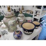 A collection of various reproduction vases and jardiniere's in Chinese style