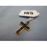 A 9ct gold hm garnet set cross