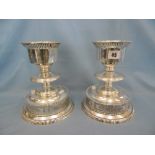 A pair of large silver plated candlesticks