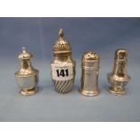 Four assorted hallmarked silver pepper pots