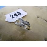 A 9ct gold and diamond dress ring,