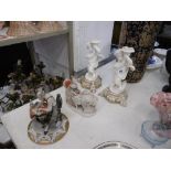 A small group of porcelain figures a.