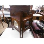 A pair of Victorian mirrored mahogany wall hanging cabinets