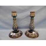 A pair of Victorian Doulton Lambeth candlesticks