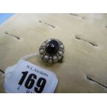 Antique unmarked dome top ring, set with Cabochon garnet, pearls and rose cut diamond,