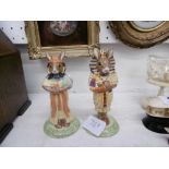 A pair of Tutenkhamun Royal Doulton figures