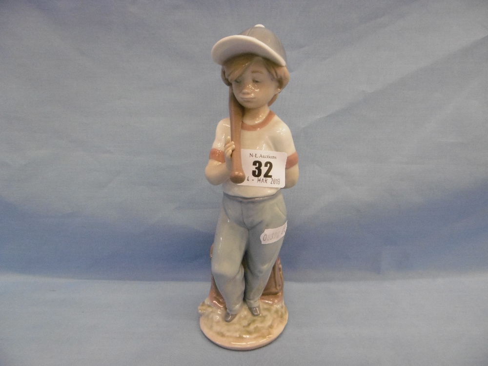 A Lladro figure "can play"