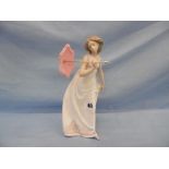 A lladro figure of lady with parosol
