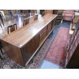 A Danish mid century designer rosewood sideboard W240cm D47cm H81cm,