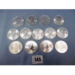 Thirteen 1 ounce fine silver Canadian maple leaf coins