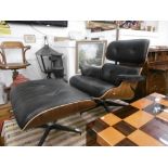 An Eames style walnut and leather lounge chair and stool A/F