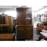 A Georgian mahogany secretaire bookcase width 119cm height 232cm depth 55cm