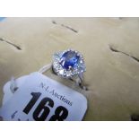 An 18ct white gold diamond and sapphire ring, sapphire 2.09ct, diamond total weight 0.