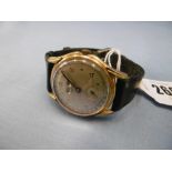 A vintage Swiss Orfina triple date gold platted gentleman's watch on leather strap