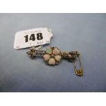 An antique diamond and heart shaped opal bar brooch